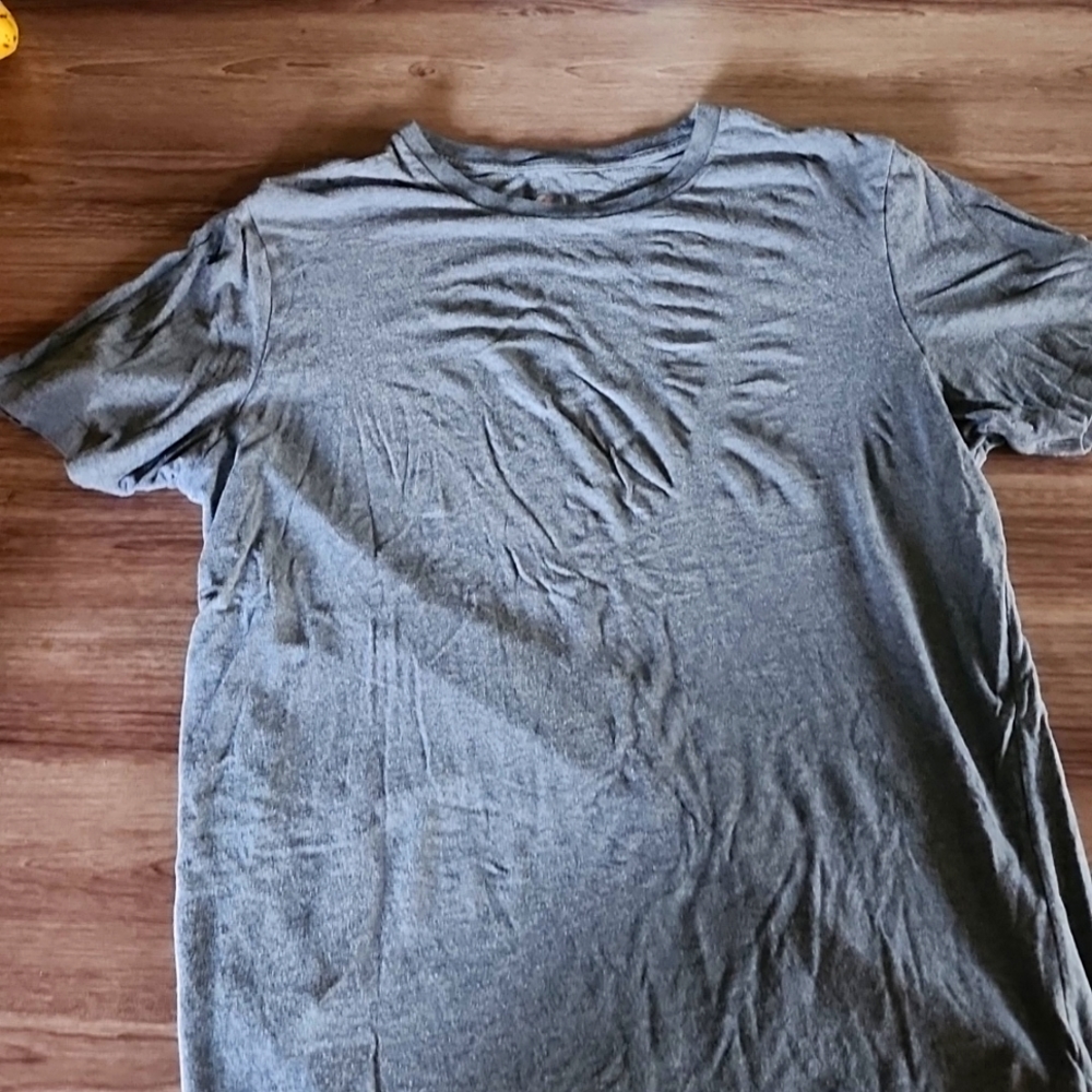 Grey Ethika shirt.